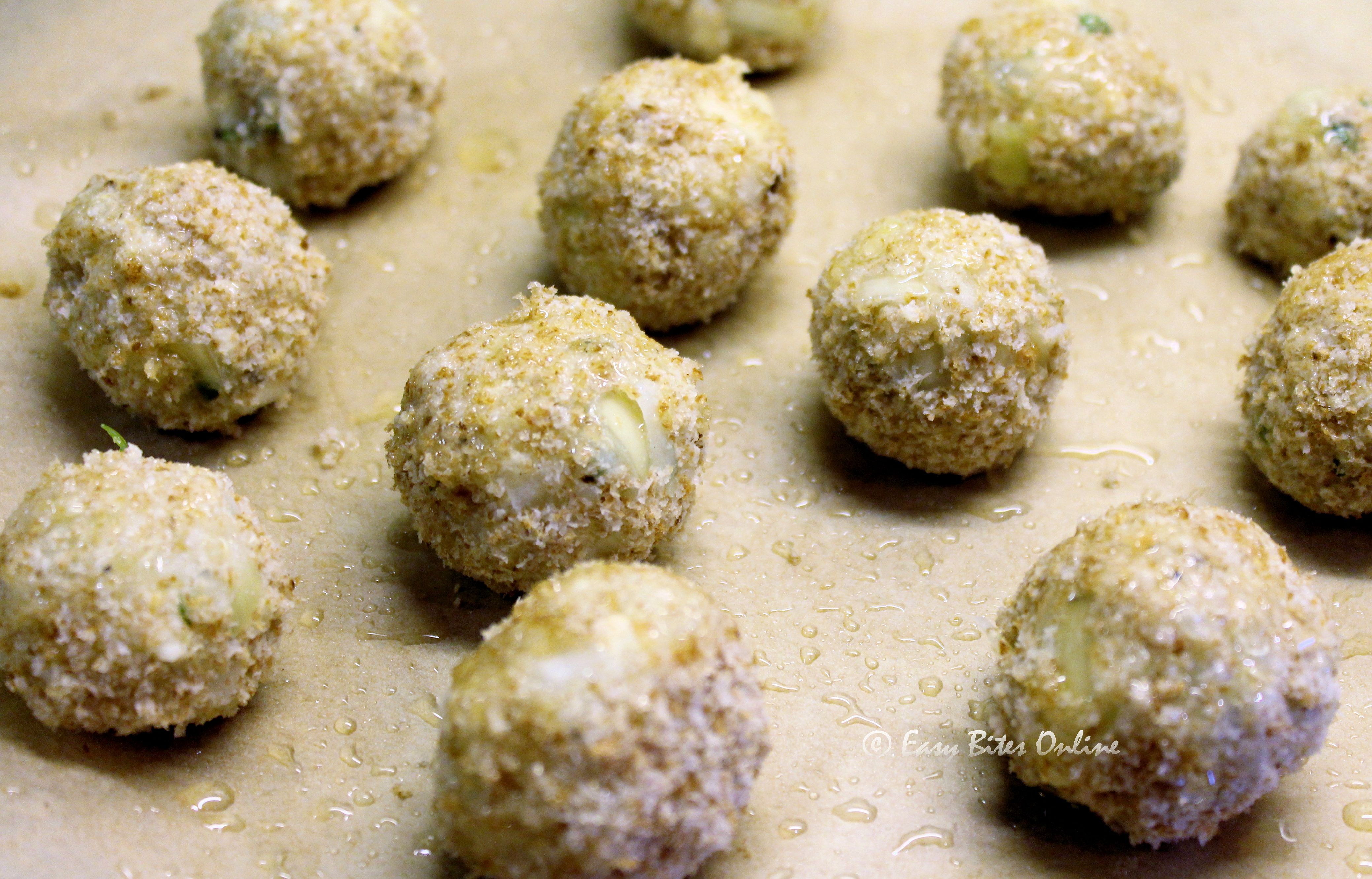 place the prepared balls over lined greased baking tray, bake at 190 deg C until golden