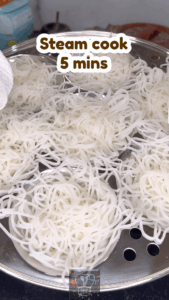 Steaming idiyappam in idli pot for 5 minutes